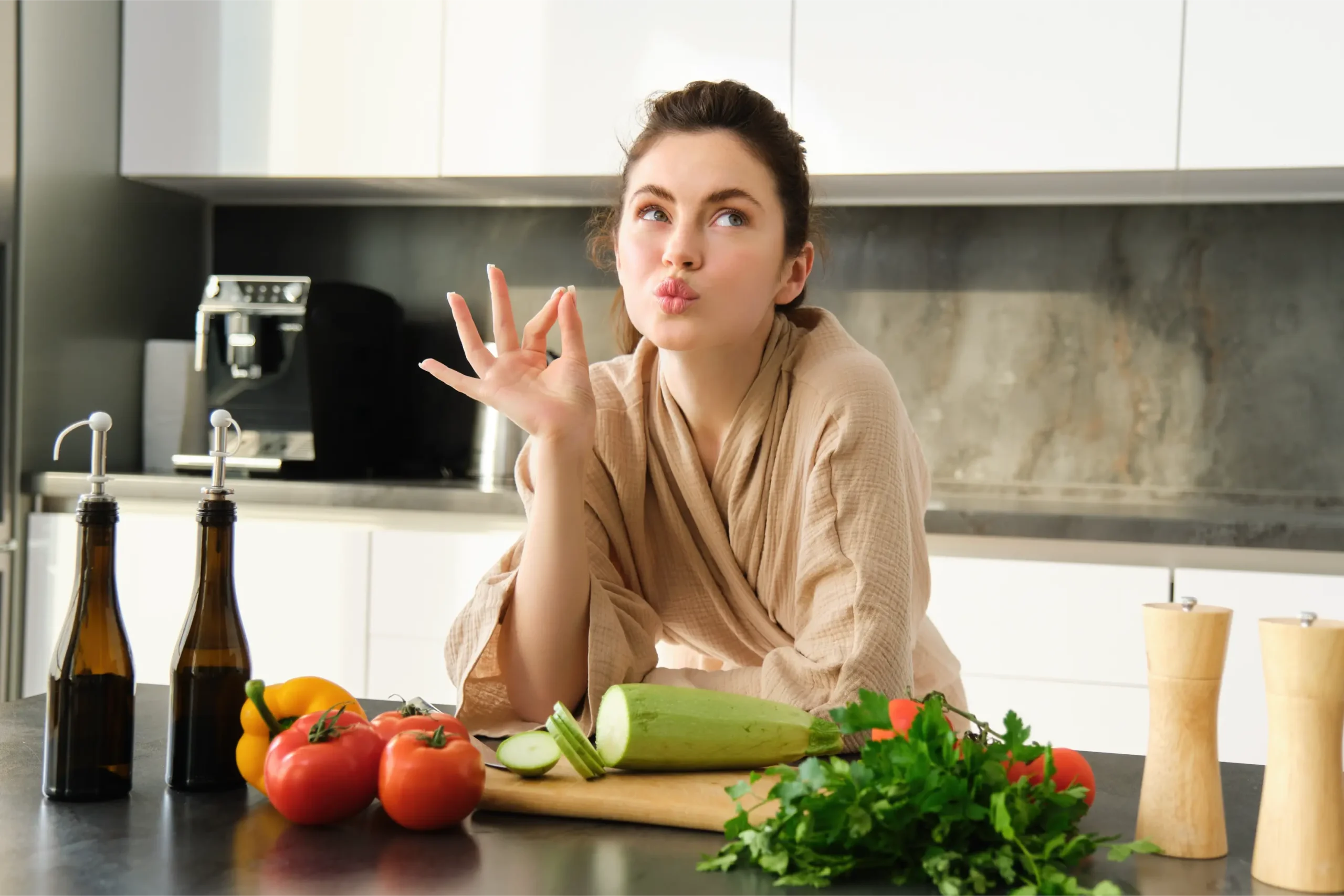 portrait beautiful young woman bathrobe cooking meal family shows chefs kiss okay sign scaled
