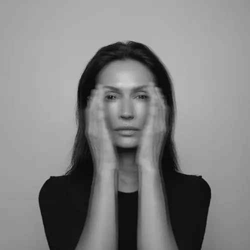 womanwithhands on her face2